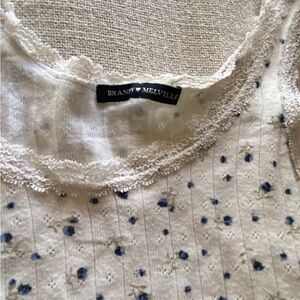 Brandy Melville White Lace Tank Top with Blue Floral Accents